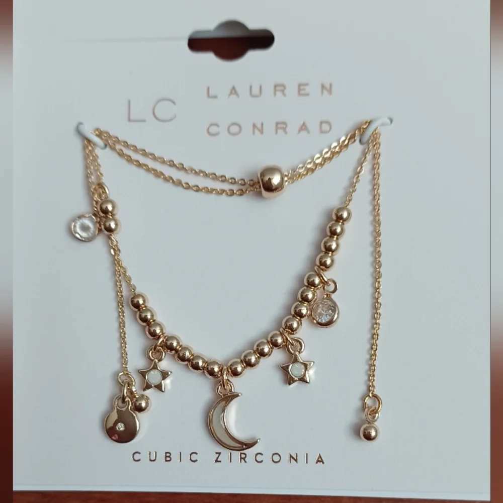 LC LAUREN CONRAD STAR AND MOON ADJUSTABLE BRACELET - Picture 2 of 3